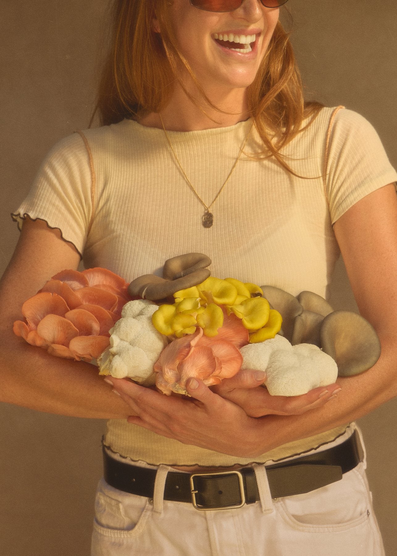 An armful of oyster and lion’s mane mushrooms picked that morning